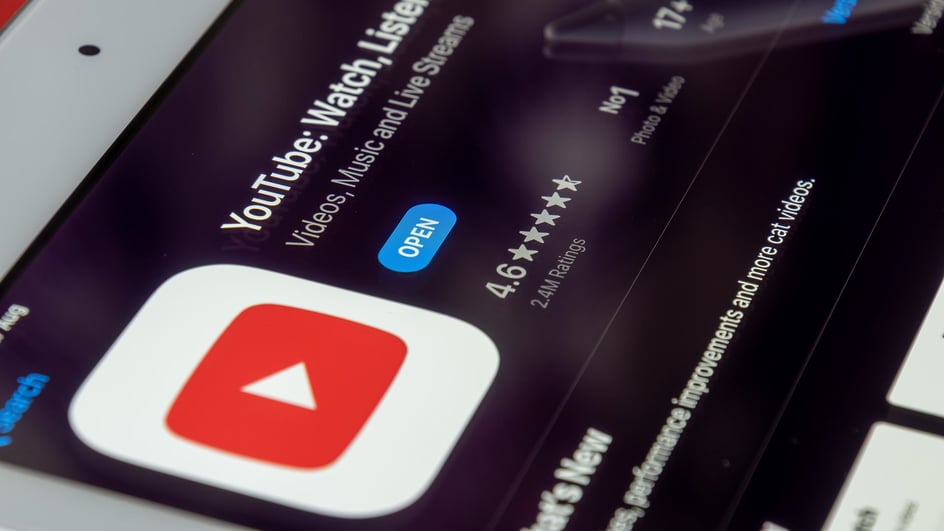  YouTube app on mobile device advertising videos with royalty free music