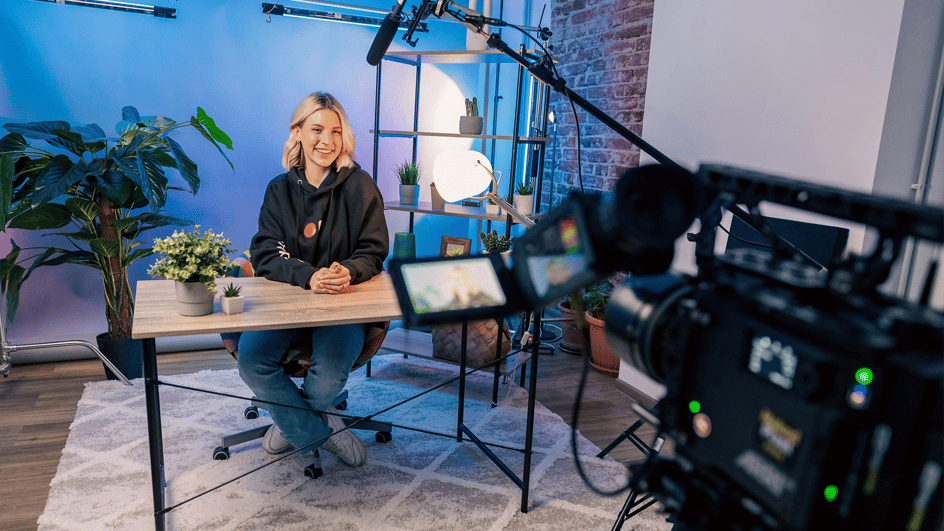  Video camera set up to record podcaster discussing the question: “Are YouTube videos considered commercial use?”