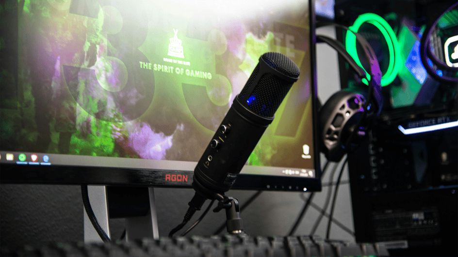  Computer monitor and microphone for recording royalty free music for Twitch