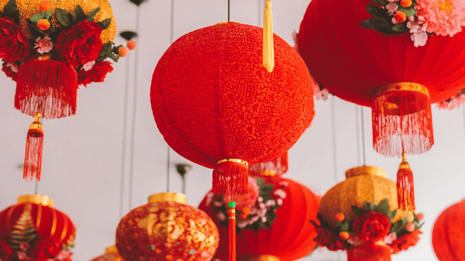  Red Chinese lanterns make a beautiful backdrop for lunar new year videos featuring royalty free Chinese New Year music.