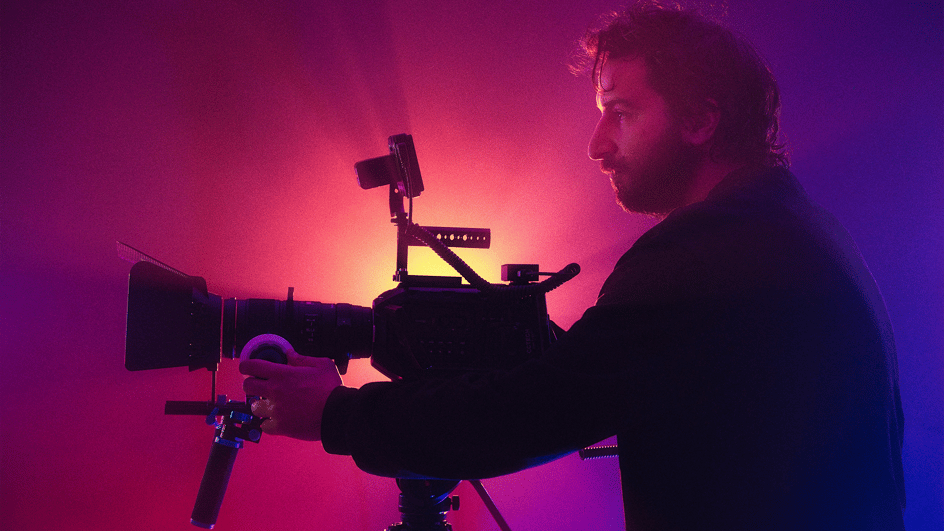  A man shoots his feature length film as he thinks about how he can find the best royalty free music for filmmakers.