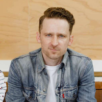 Josh Collum, an expert in music synchronization licenses, showcasing over 15 years of experience in the sync industry.