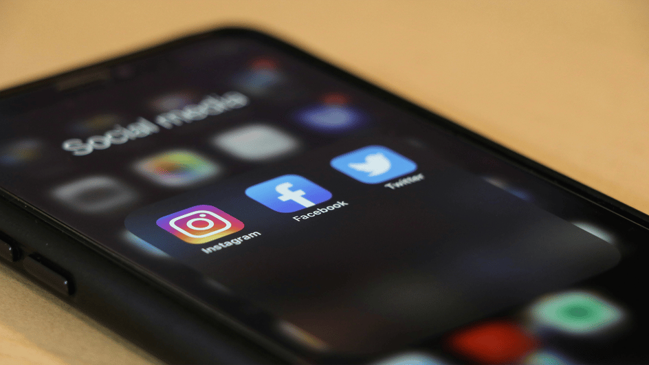  Black smartphone displaying social media icons